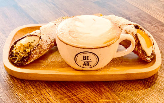 delicious cappuccino and cannelloni sweet with cream 