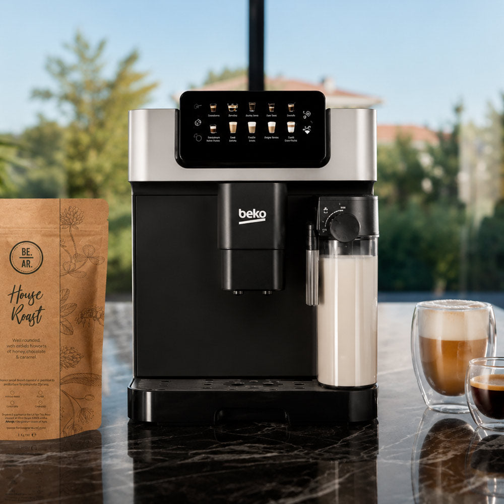 Beko CEG7304X coffee machine on a table with a coffee bag and two cups of coffee in the background.