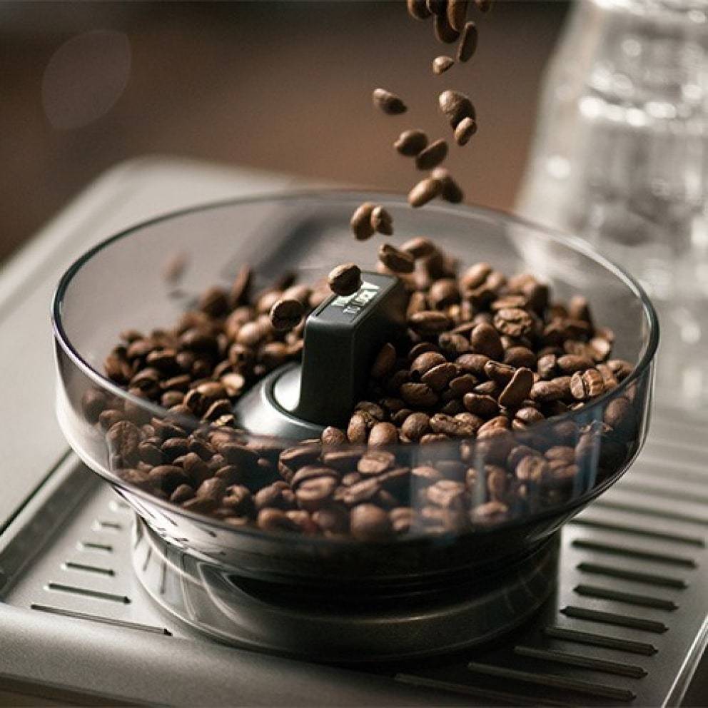 Coffee hopper on top of the Sage Barista Touch Black Truffle Espresso Machine